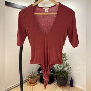 Plunge neck bodysuit